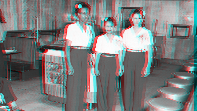 Hostesses in front of Aireon 1200A Airliner Super Deluxe