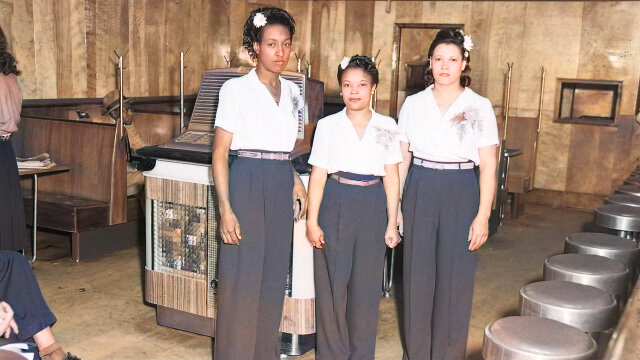Hostesses in front of Aireon 1200A Airliner Super Deluxe
