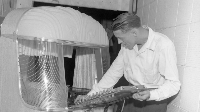 AMI employee with model B (1948-1949)