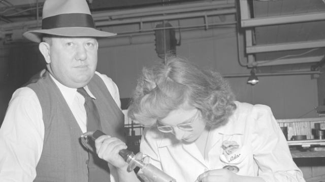 Homer E. Capehart with Packard employee